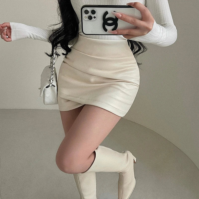 WOMENGAGA Spicy Girl Sexy High Waist Slim A-LINE Wrinkle Wrapped Hip PU Leather Skirt Short Skirt Sweet Korean Women 8EGA